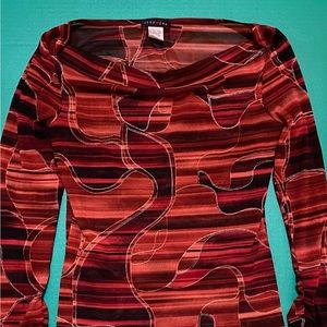 Monochromatic red stripped and swirl top with silver dotted lined accents